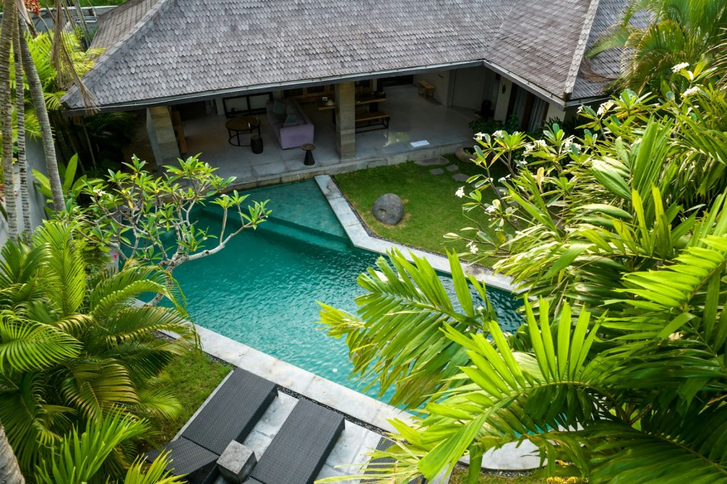 Aerial view of a tropical pool villa